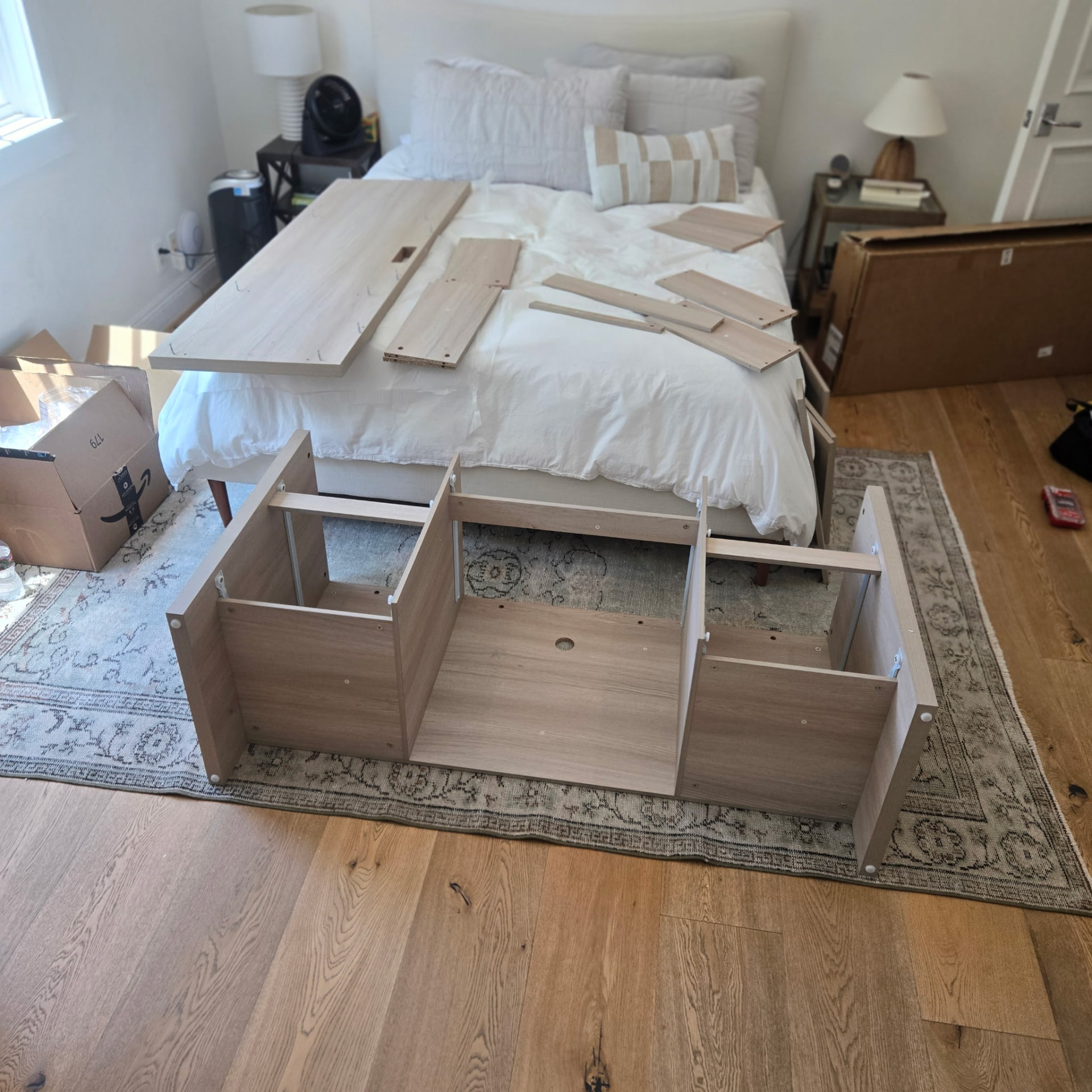 Dresser being assembled in a bedroom